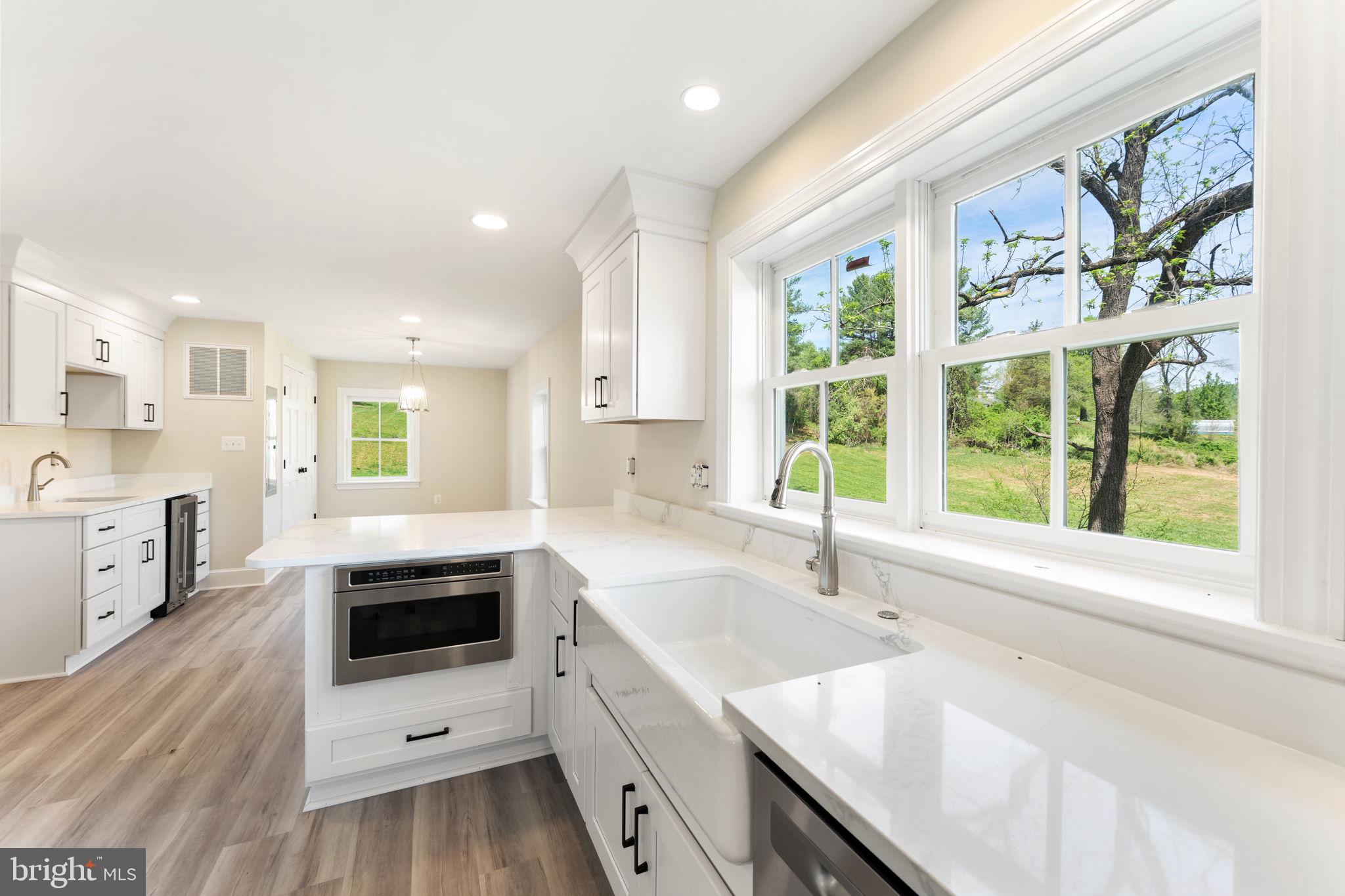 11066 Moreland Road Delaplane, VA 20144 - Photo 34 of 87 a kitchen with a sink and large window