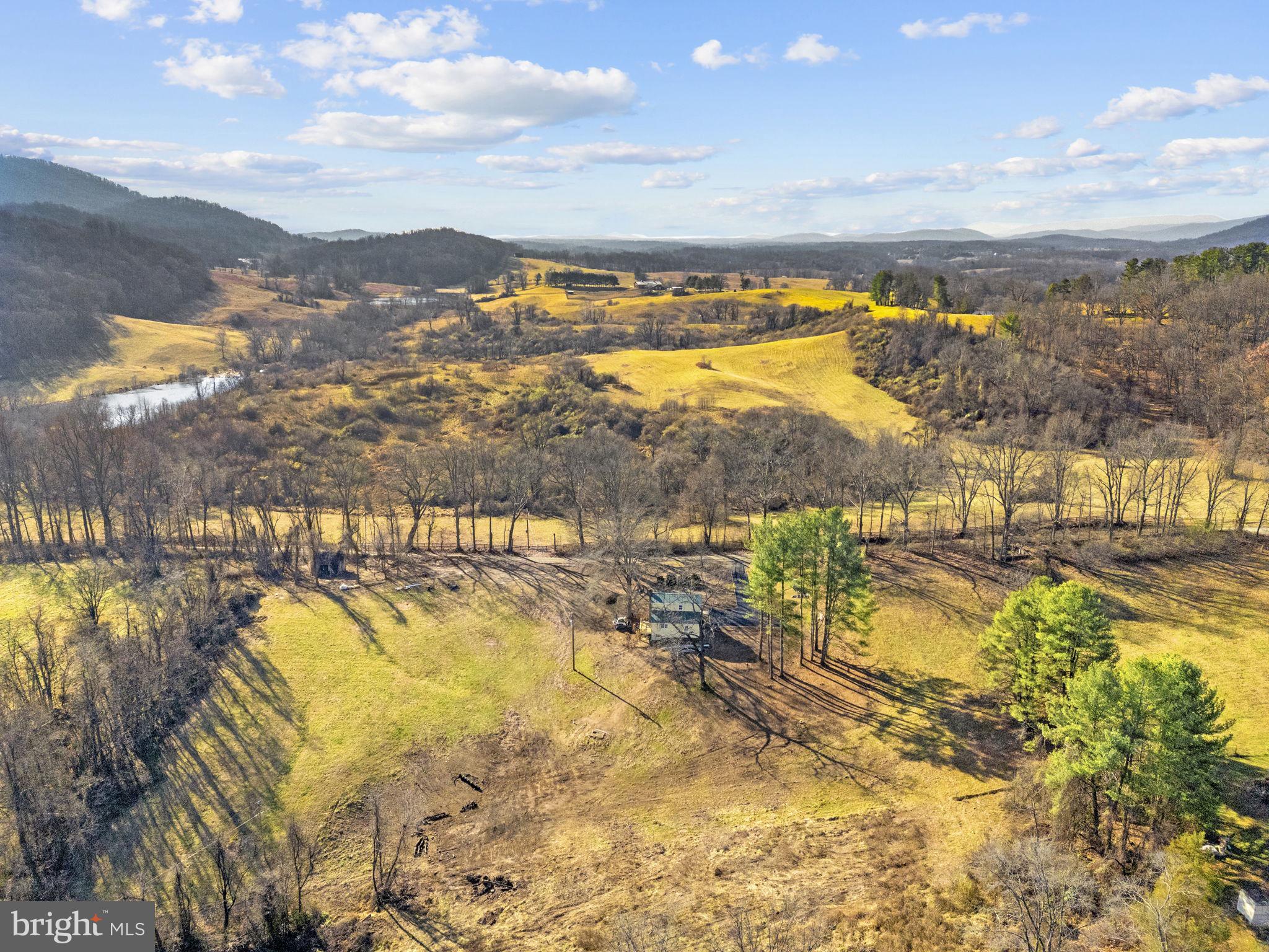 11066 Moreland Road Delaplane, VA 20144 - Photo 35 of 37 a view of a lake with a mountain
