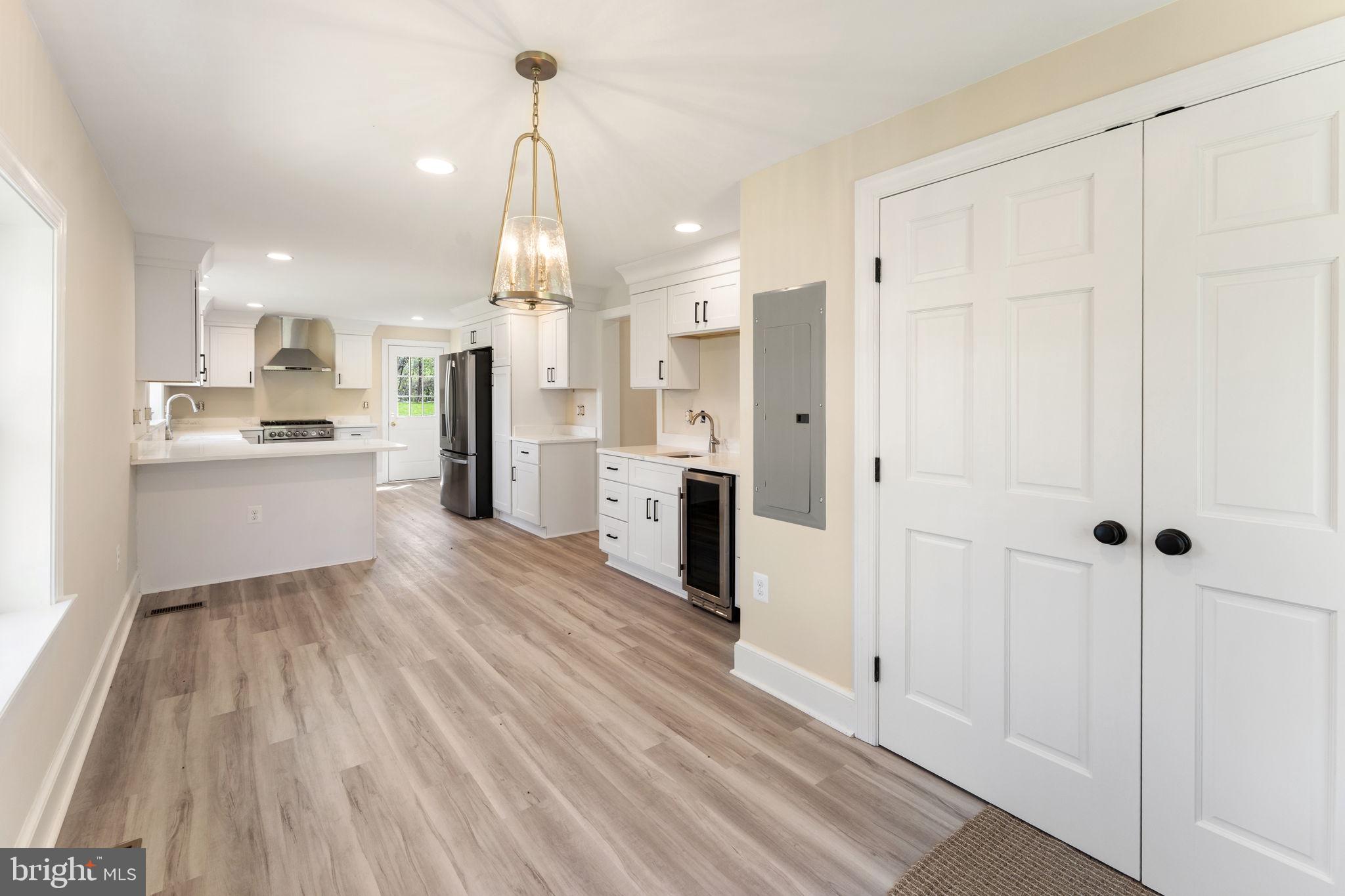 11066 Moreland Road Delaplane, VA 20144 - Photo 46 of 87 a view of a kitchen with wooden floor and a kitchen