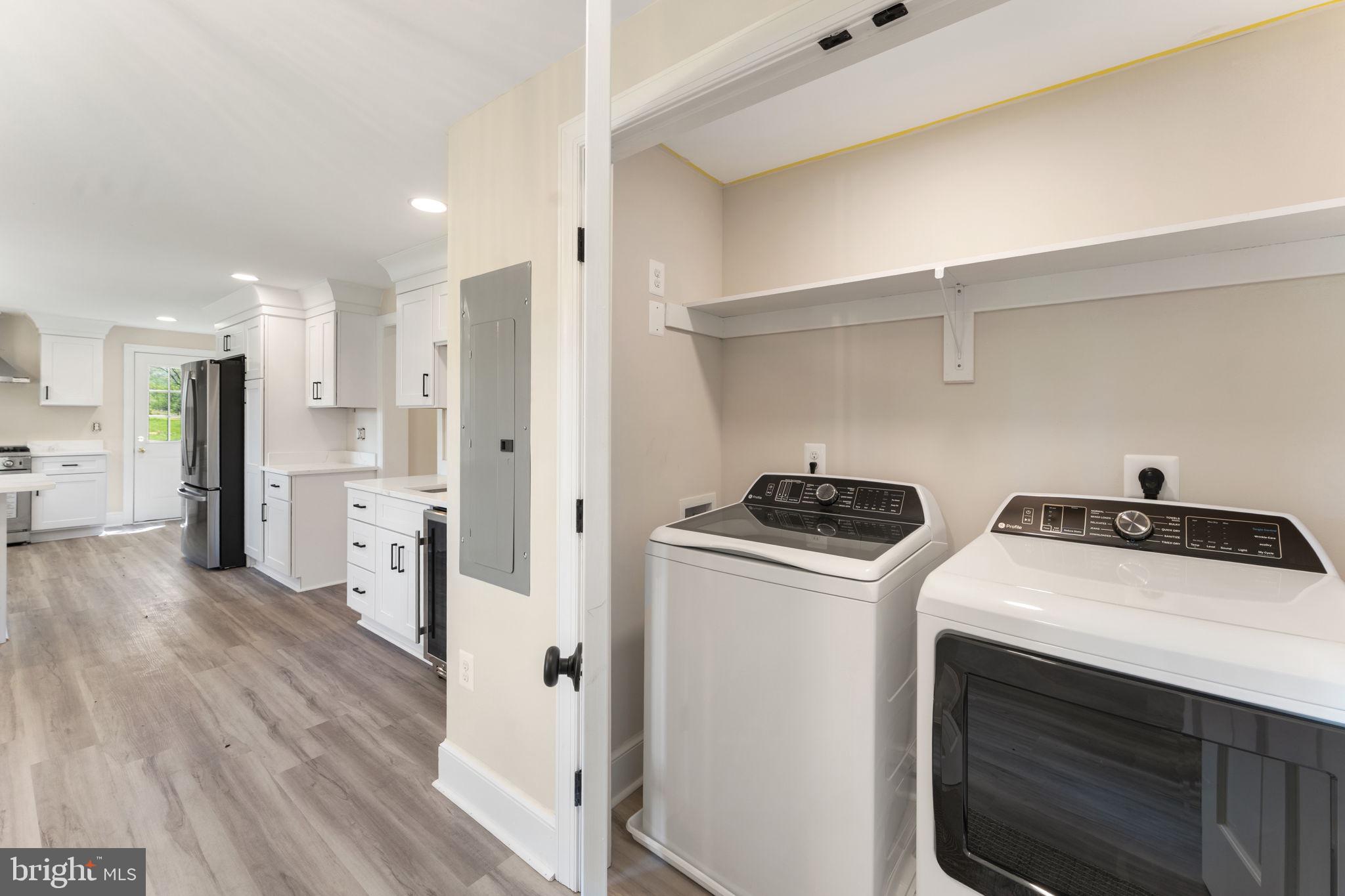 11066 Moreland Road Delaplane, VA 20144 - Photo 48 of 87 a kitchen with a stove sink and refrigerator