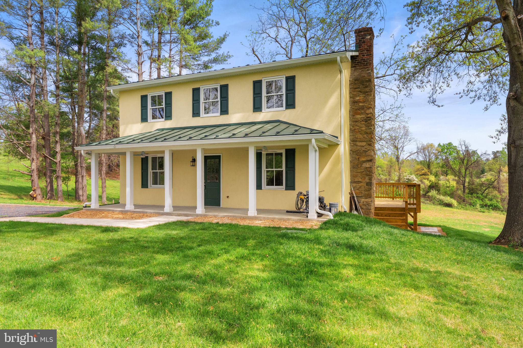 11066 Moreland Road Delaplane, VA 20144 - Photo 5 of 87 front view of a house with a yard