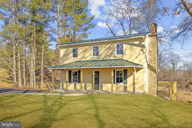 a front view of a house with swimming pool