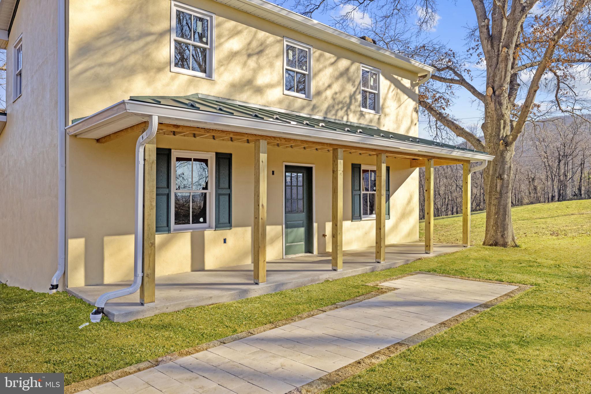 11066 Moreland Road Delaplane, VA 20144 - Photo 8 of 37 a front view of a house