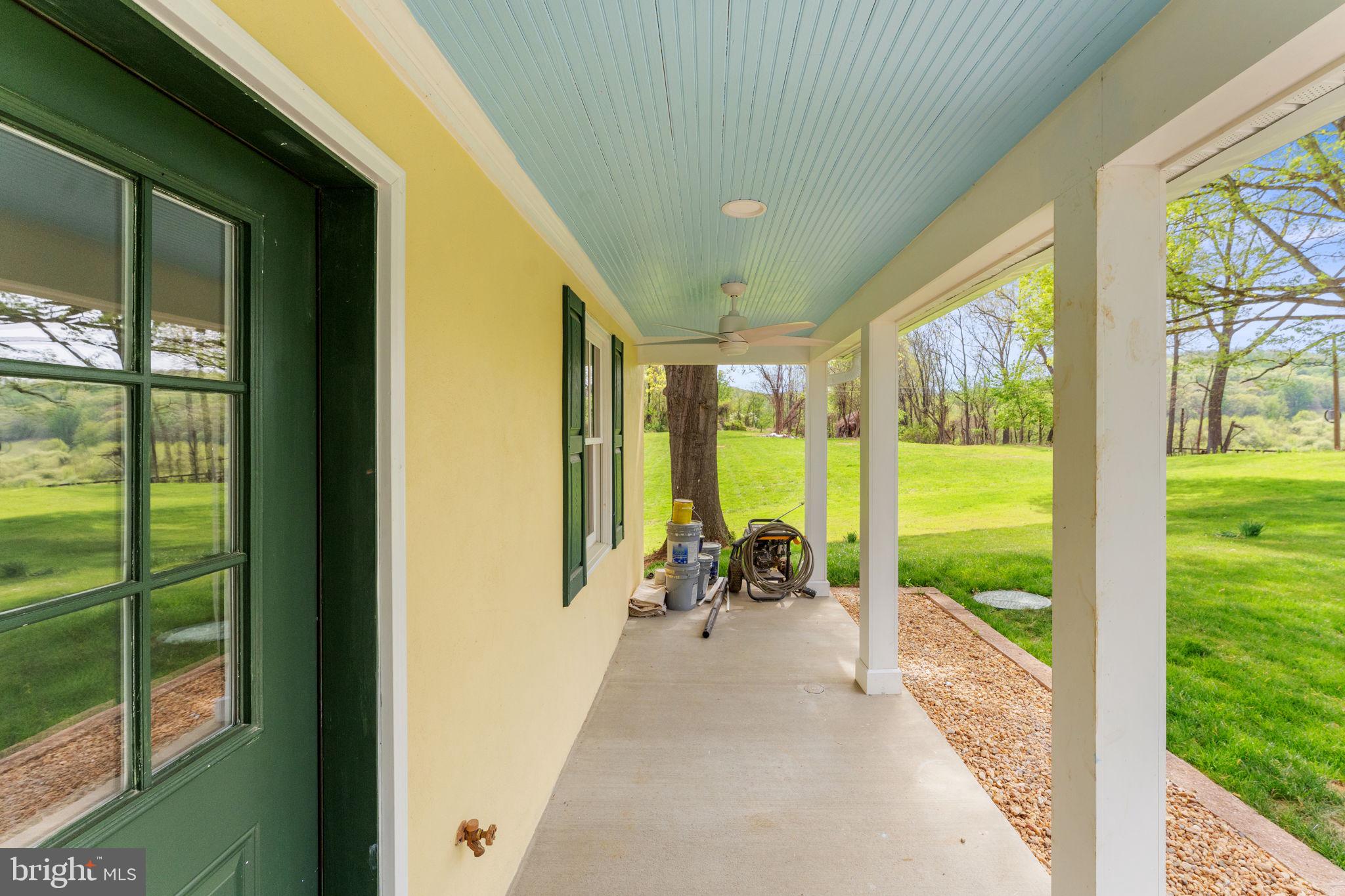 11066 Moreland Road Delaplane, VA 20144 - Photo 9 of 87 a view of a porch with furniture and garden