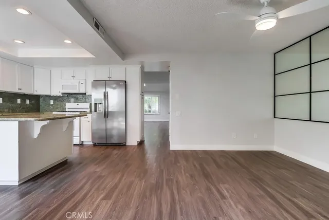 a view of entryway with washer and dryer
