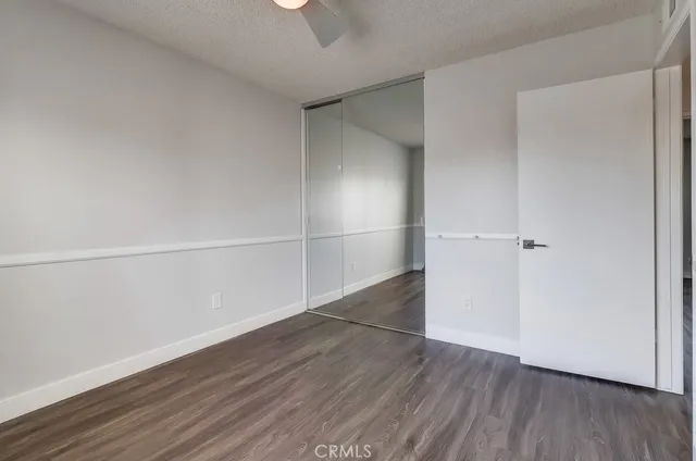 a view of a house with swimming pool and sitting area