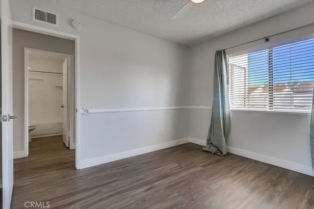 a view of a garden with a pathway