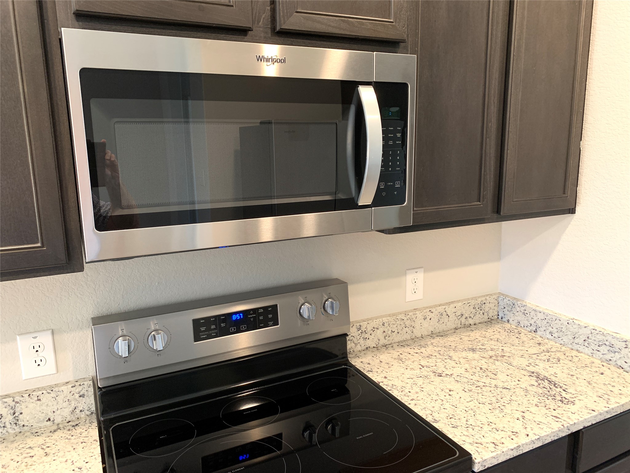 112 Declaration Lane Liberty Hill, TX 78642 - Photo 6 of 15 a kitchen with a stove and a microwave