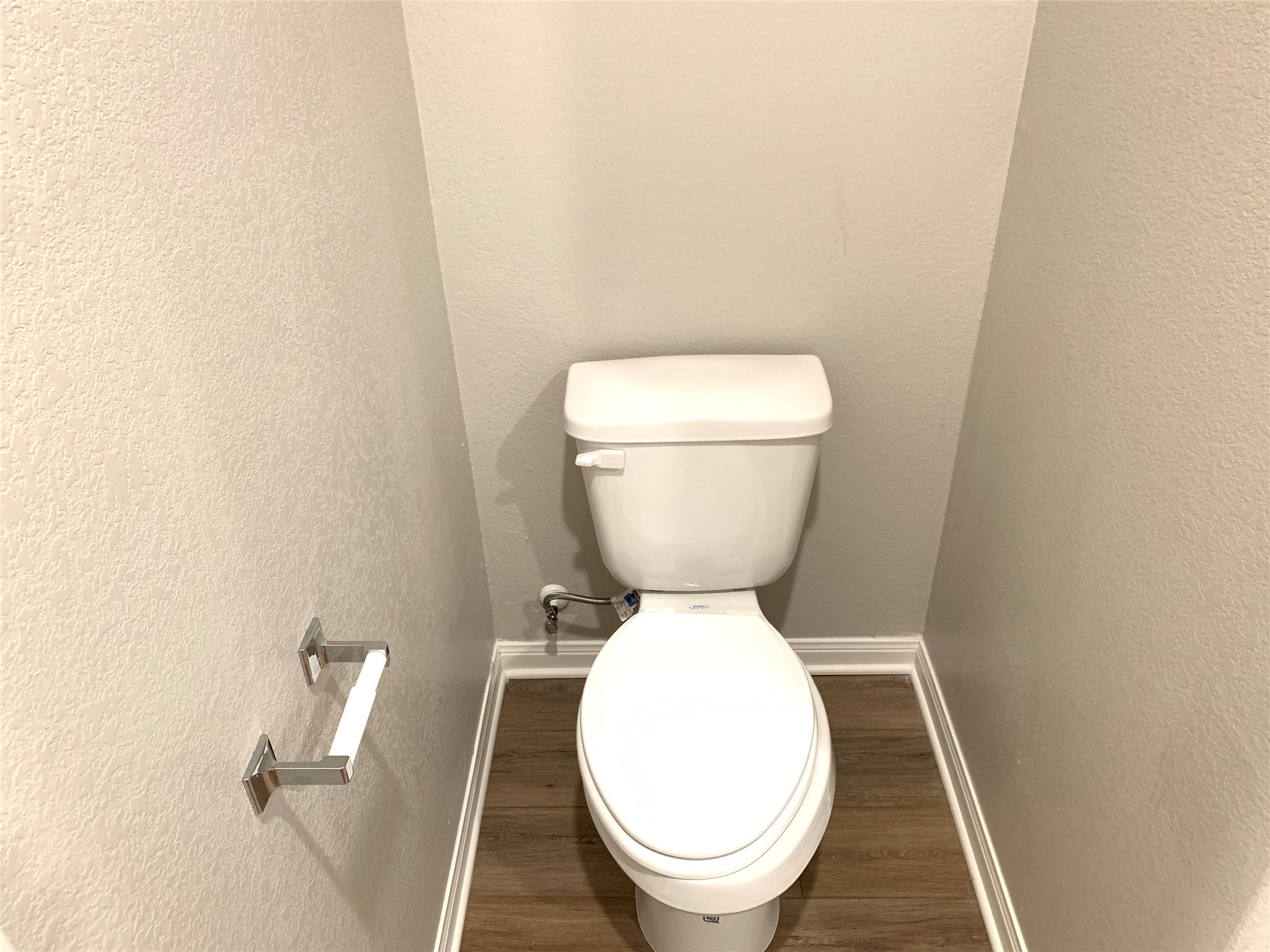 112 Declaration Lane Liberty Hill, TX 78642 - Photo 9 of 15 a close up of a toilet in a small yard