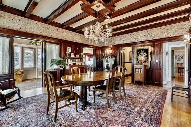 a dining room with furniture and window