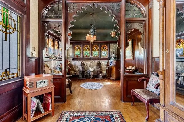 a outdoor living space with furniture and a fireplace