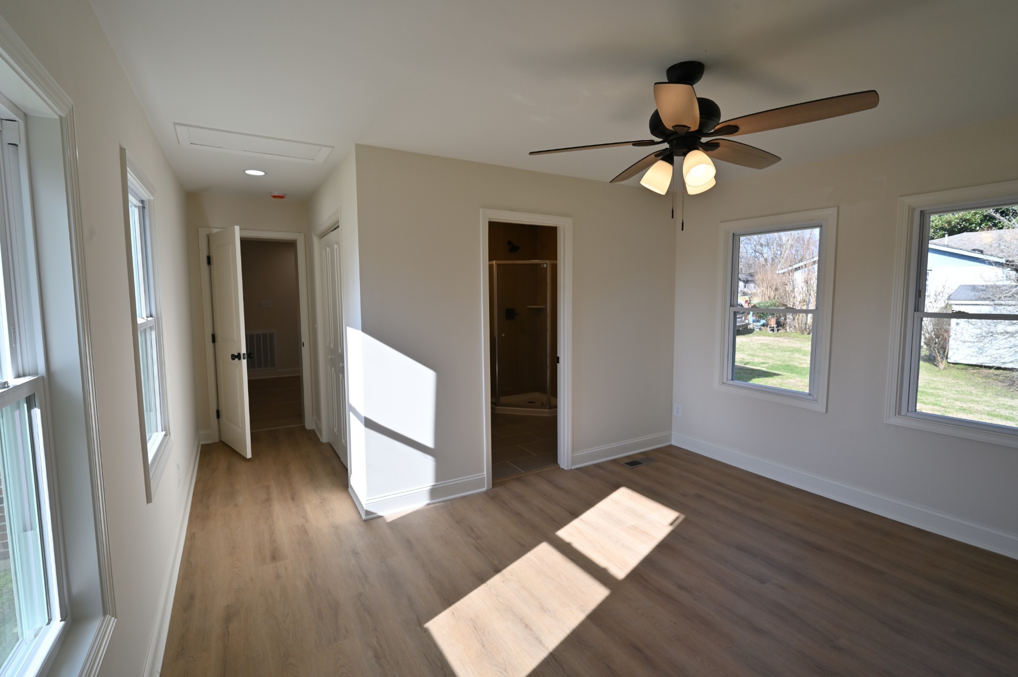 808 Hughes Street Spring Hill, TN 37174 - Photo 14 of 24 wooden floor in an empty room with a window