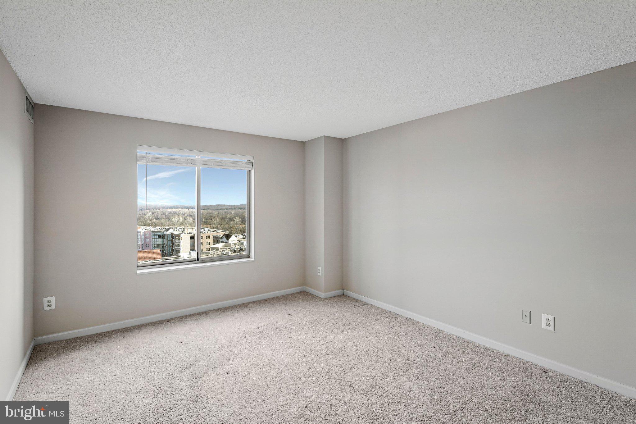19385 Cypress Ridge Terrace, Unit 815 Leesburg, VA 20176 - Photo 15 of 35 an empty room with windows
