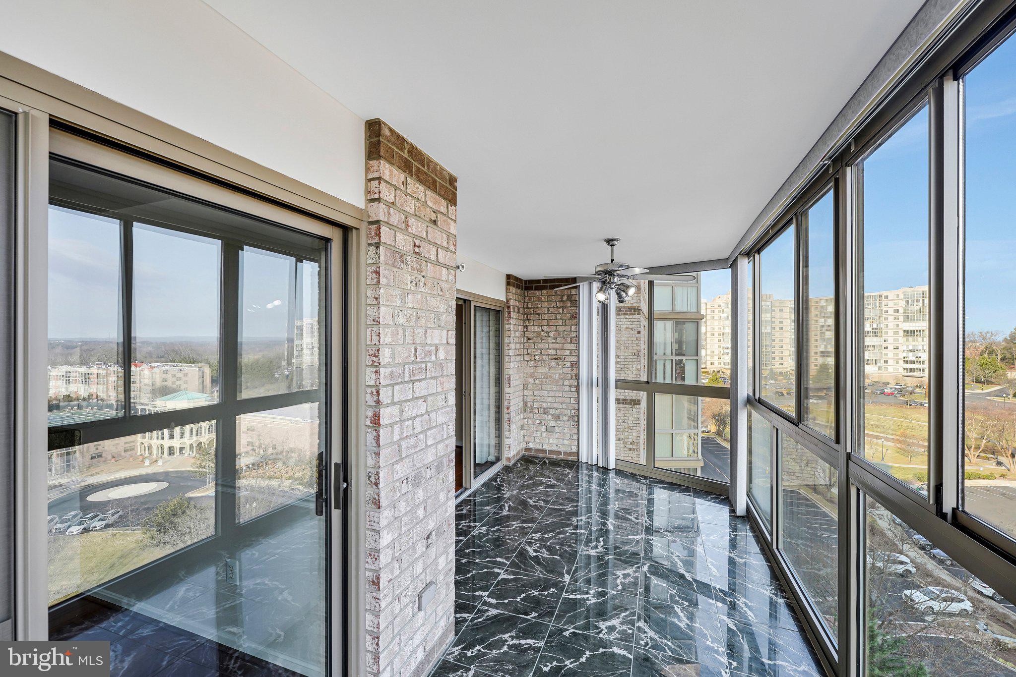 19385 Cypress Ridge Terrace, Unit 815 Leesburg, VA 20176 - Photo 26 of 35 a view of hallway with a large window