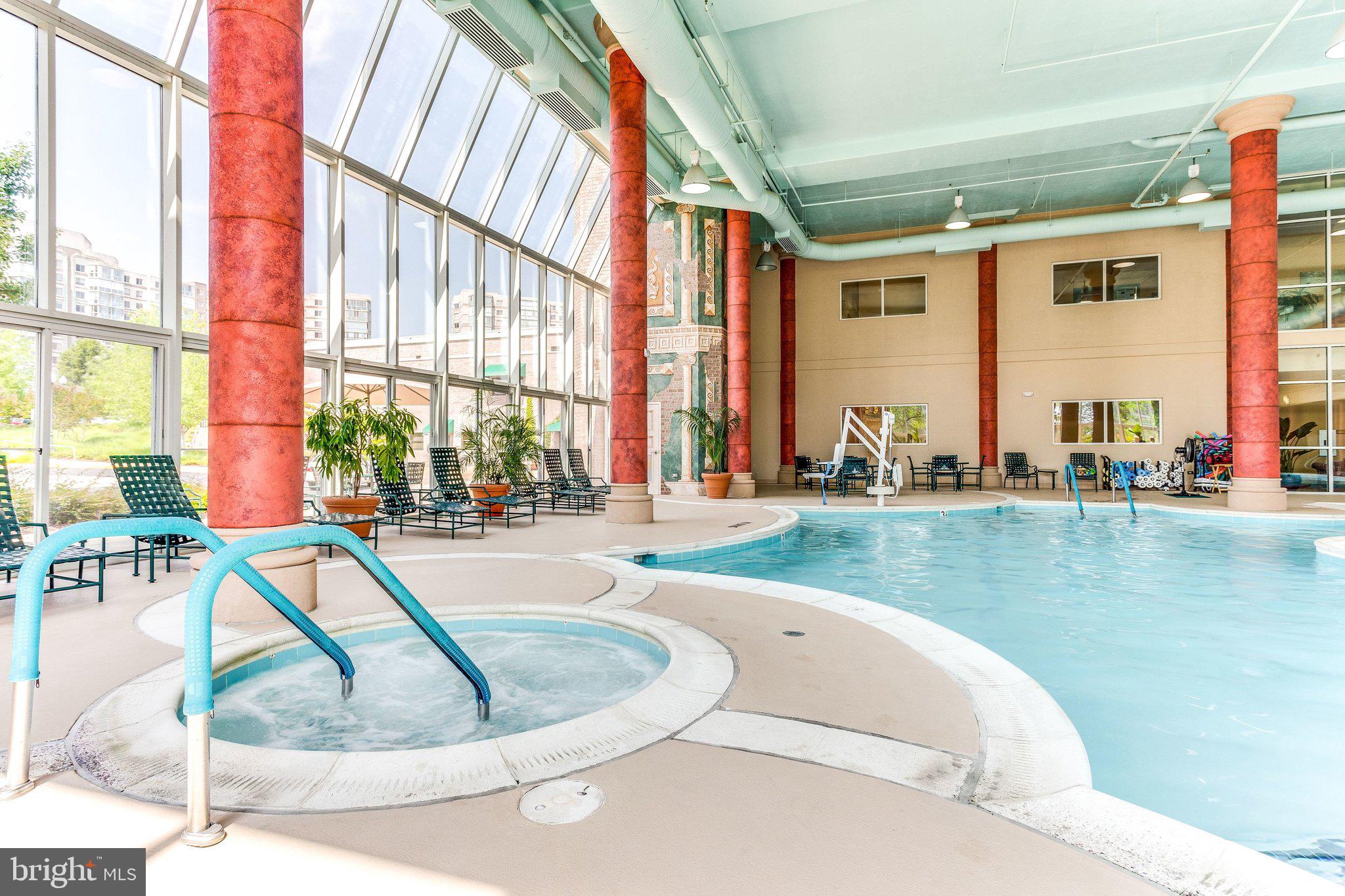 19385 Cypress Ridge Terrace, Unit 815 Leesburg, VA 20176 - Photo 31 of 35 a view of swimming pool with outdoor seating