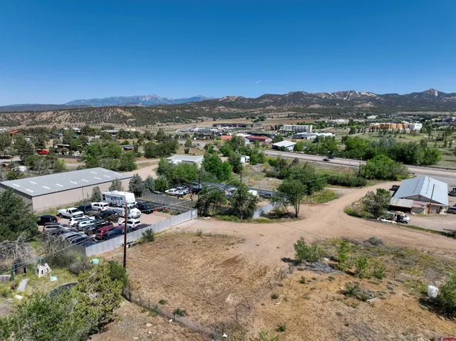 a view of a road with a yard
