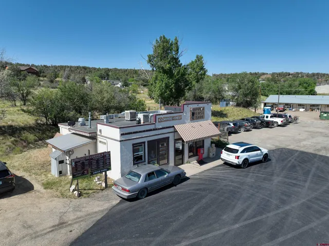 a car parked in front of a road