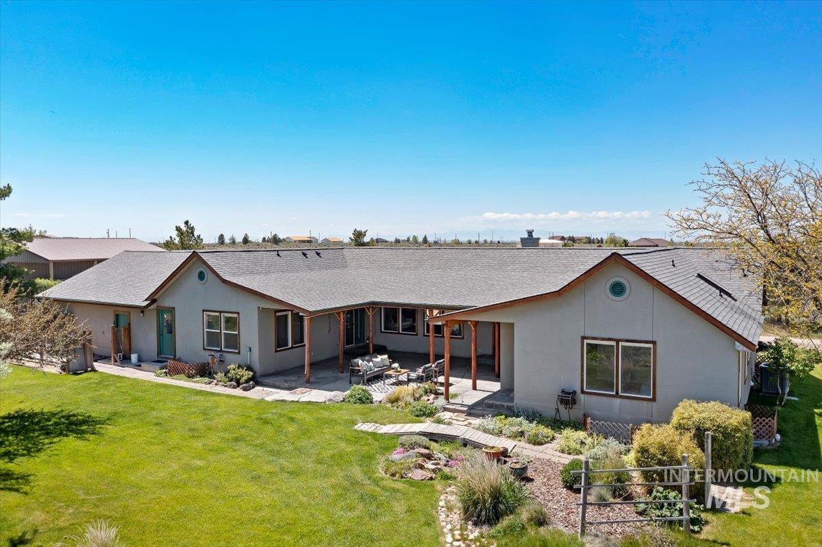 147 East Indian Crk Road Boise, ID 83716 - Photo 39 of 43 Single-story residence featuring a gray exterior and a shingled roof
