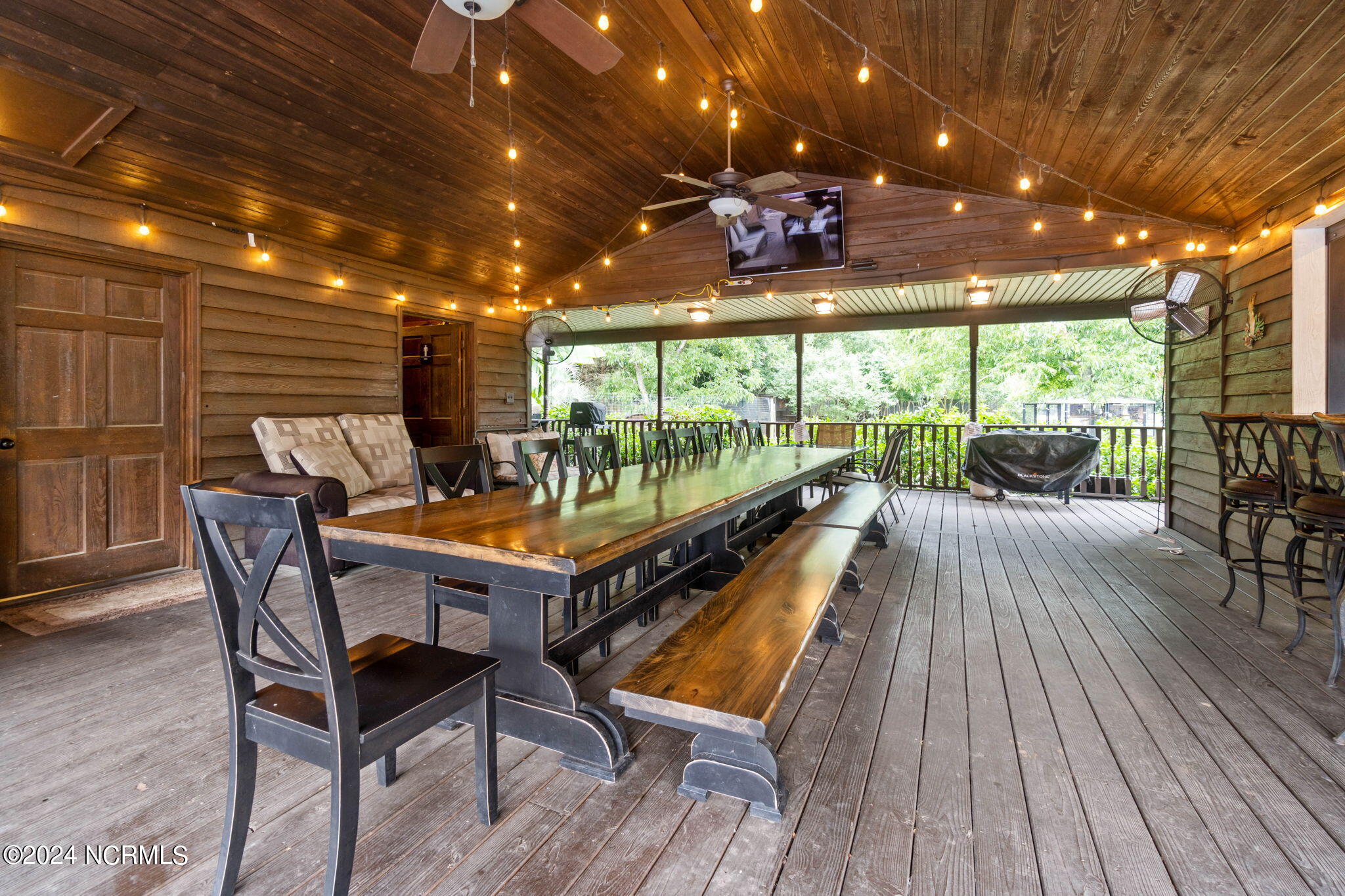 1491 Lanvale Road Leland, NC 28451 - Photo 61 of 95 Outdoor Covered Deck by Kitchen and Pool