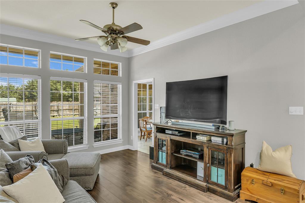 5613 Landsdown Drive Waco, TX 76708 - Photo 13 of 27 a living room with furniture and a flat screen tv