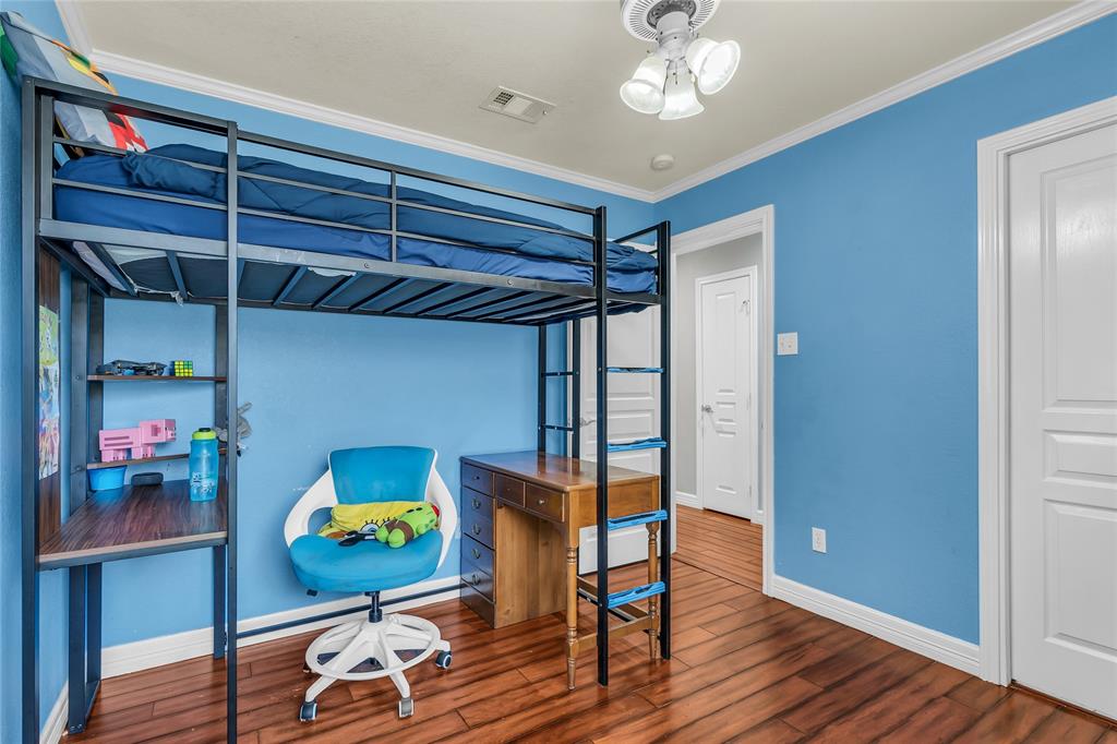 5613 Landsdown Drive Waco, TX 76708 - Photo 23 of 27 a view of a room with wooden floor and furniture