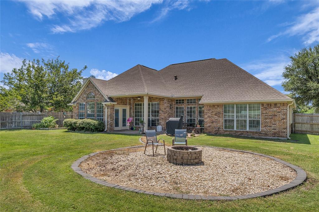 5613 Landsdown Drive Waco, TX 76708 - Photo 24 of 27 a view of a house with backyard porch and sitting area