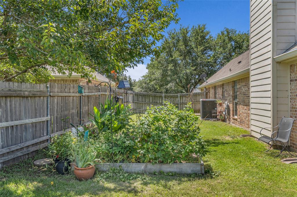 5613 Landsdown Drive Waco, TX 76708 - Photo 27 of 27 a view of a backyard with plants