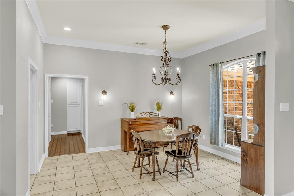 5613 Landsdown Drive Waco, TX 76708 - Photo 10 of 27 a view of a dining room with furniture window and outside view