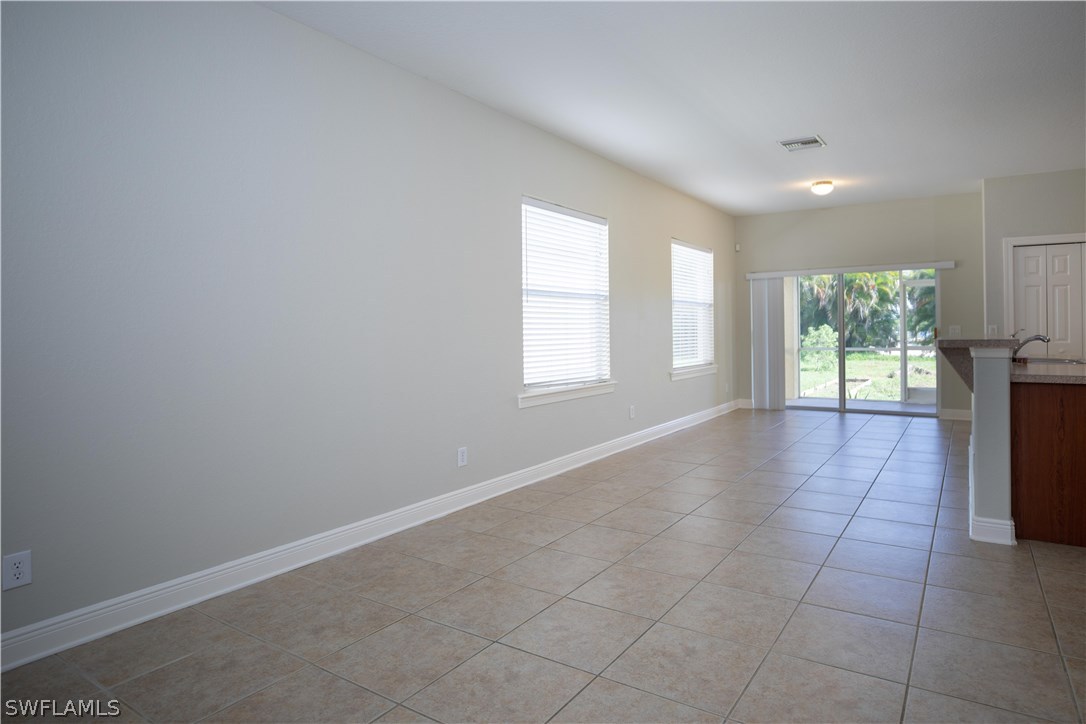 12722 River Road Fort Myers, FL 33905 - Photo 4 of 18 a view of an empty room with a window