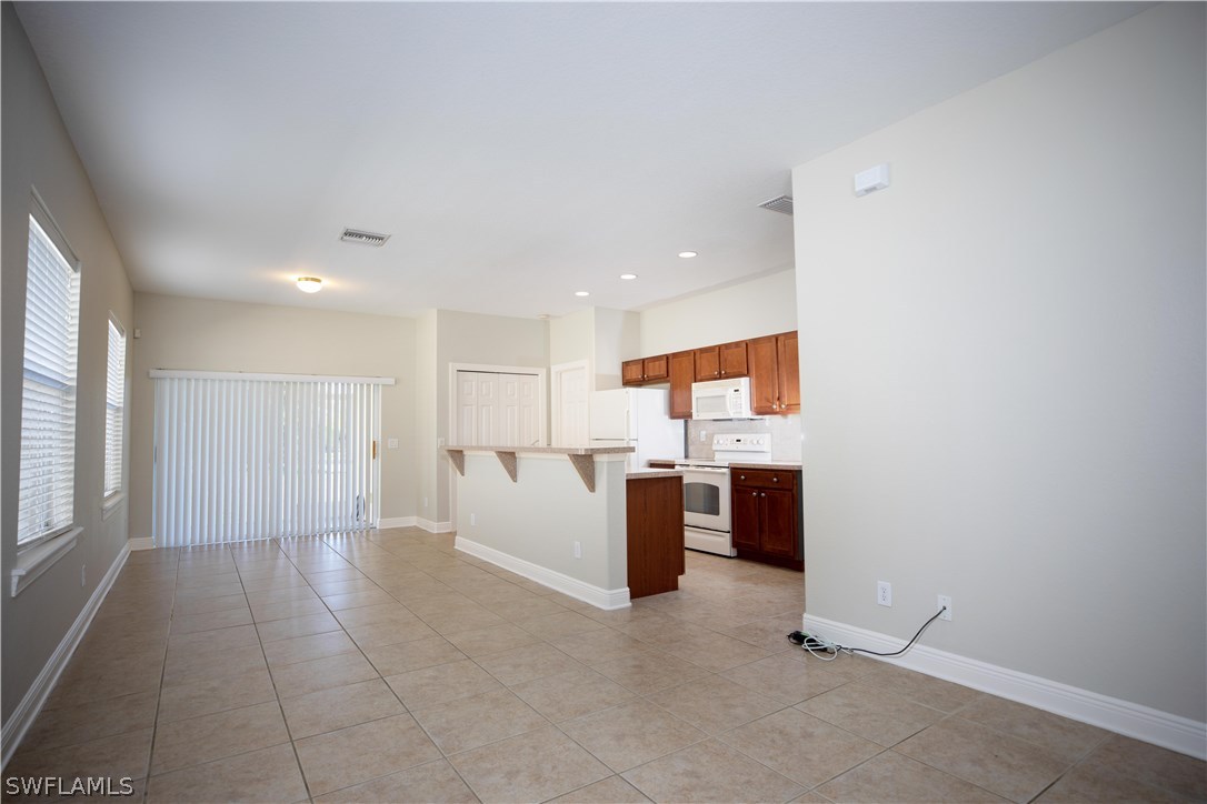 12722 River Road Fort Myers, FL 33905 - Photo 5 of 18 a view of a kitchen with a sink and a window