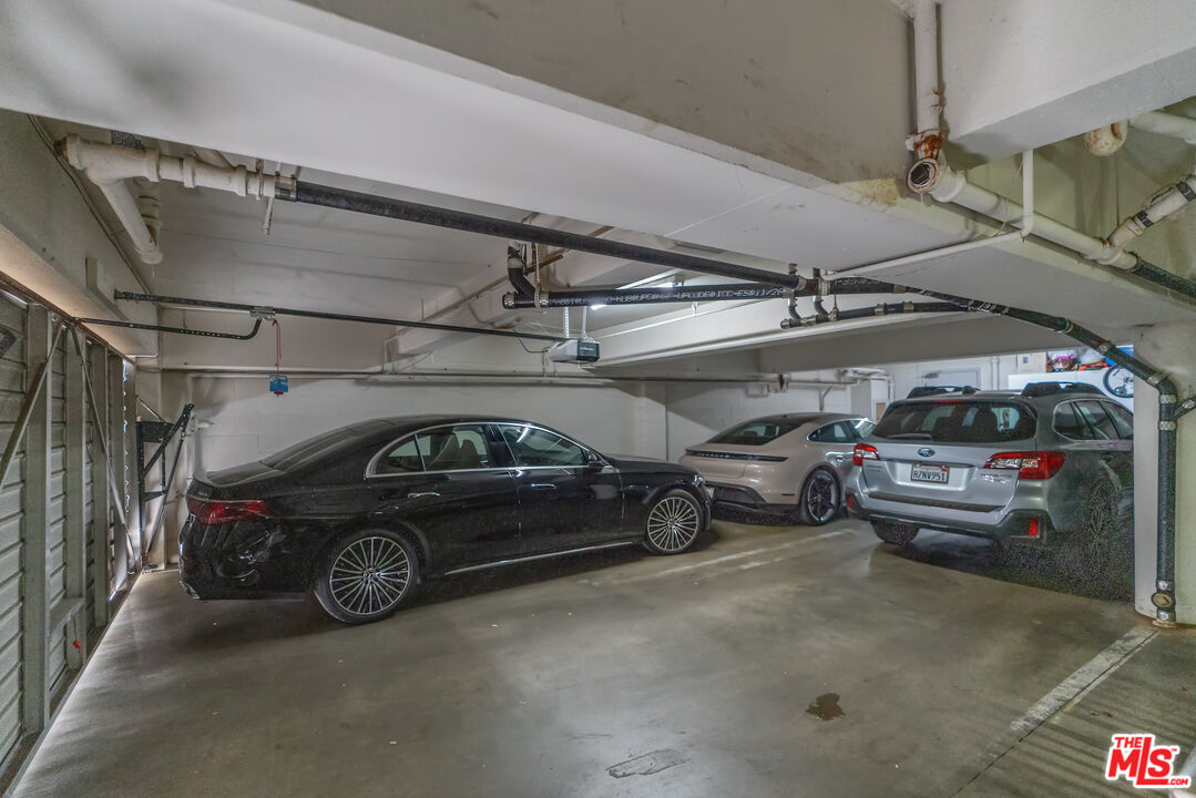 603 North Doheny Drive, Unit 2B Beverly Hills, CA 90210 - Photo 21 of 21 a view of parking garage with cars parked