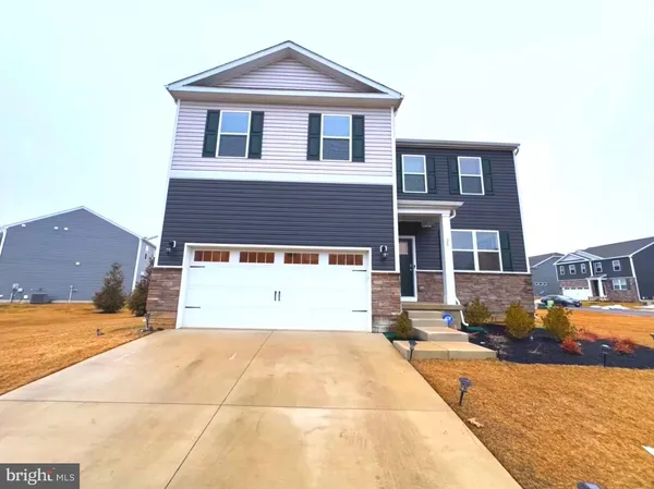 a house view with a outdoor space