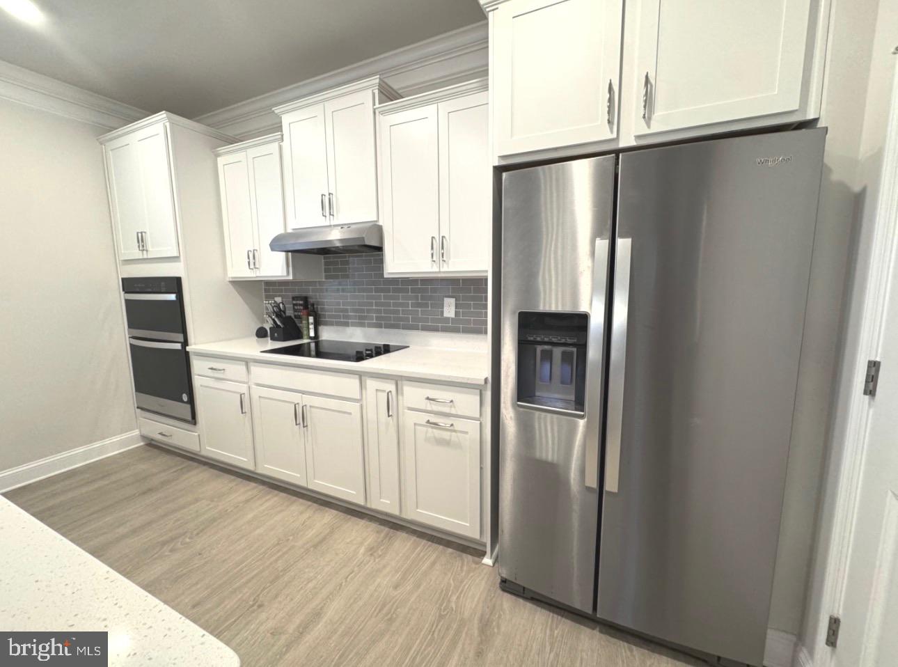 28 Buttercup Circle Elkton, MD 21921 - Photo 11 of 27 a kitchen with stainless steel appliances a refrigerator sink and cabinets