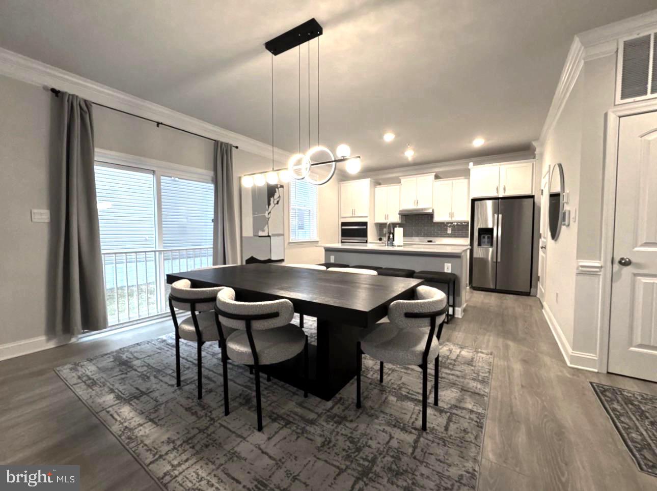 28 Buttercup Circle Elkton, MD 21921 - Photo 12 of 27 a dining hall with stainless steel appliances kitchen island granite countertop furniture and a large window