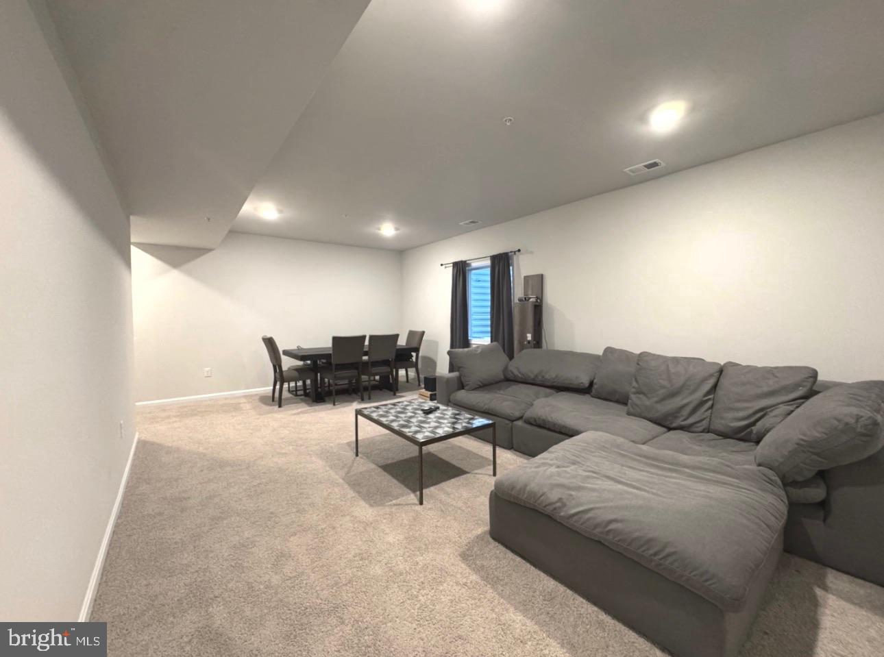 28 Buttercup Circle Elkton, MD 21921 - Photo 18 of 27 a living room with furniture and a wooden floor