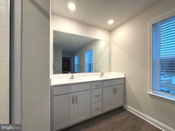 a bedroom with furniture and a couch