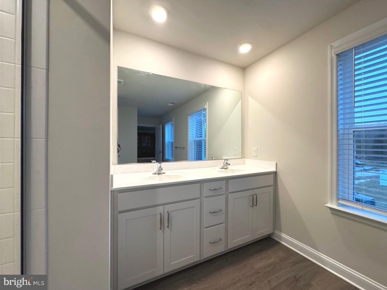 28 Buttercup Circle Elkton, MD 21921 - Photo 23 of 27 a spacious bathroom with a double vanity sink and mirror