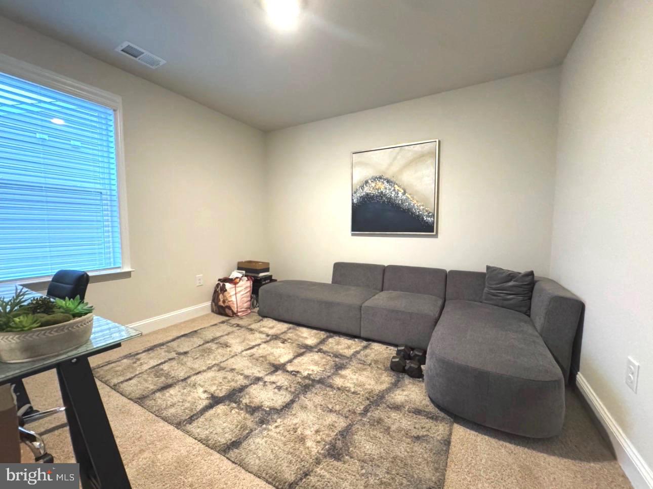 28 Buttercup Circle Elkton, MD 21921 - Photo 24 of 27 a bedroom with furniture and a couch