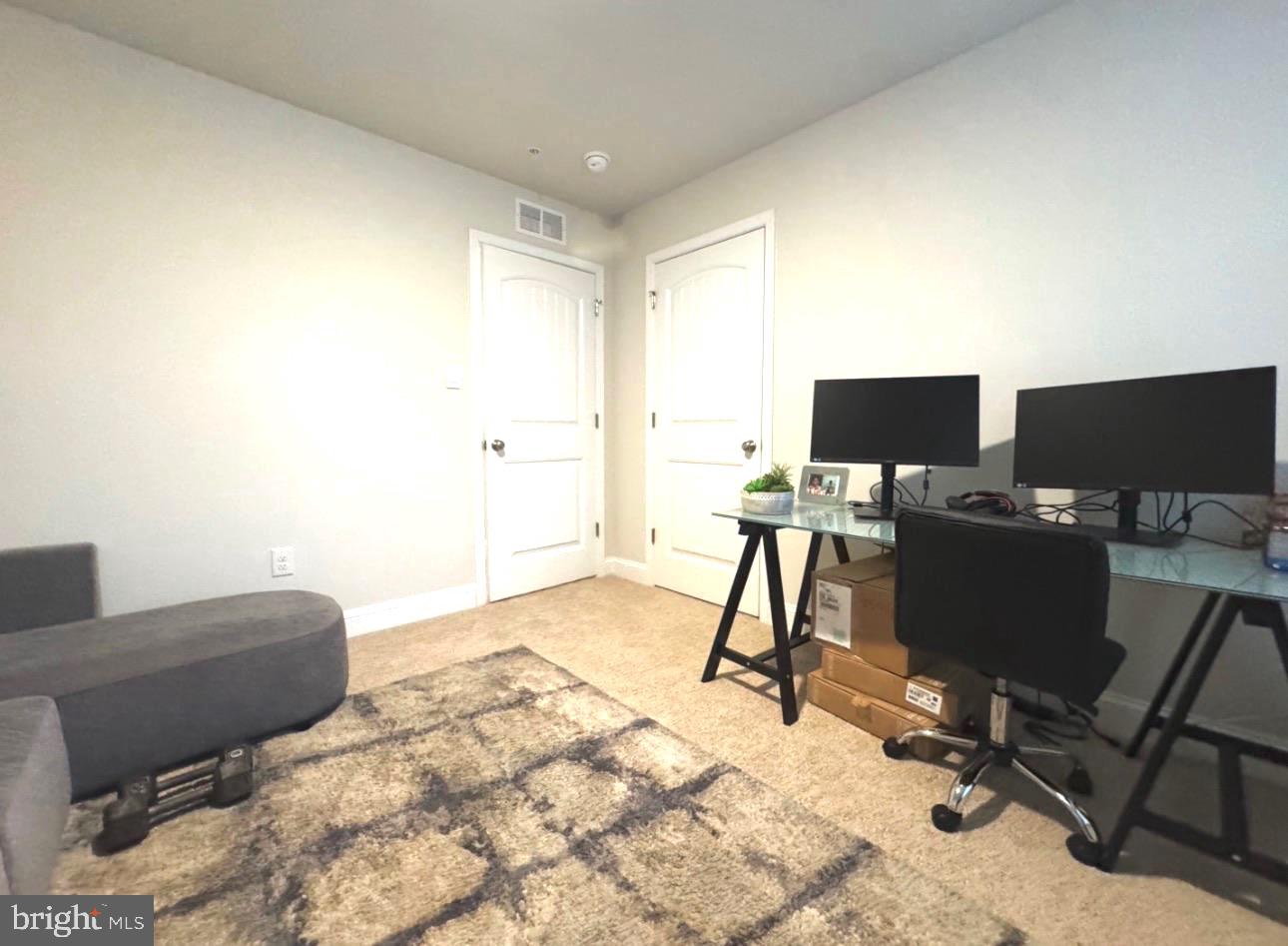 28 Buttercup Circle Elkton, MD 21921 - Photo 25 of 27 a view of workspace with wooden floor windows