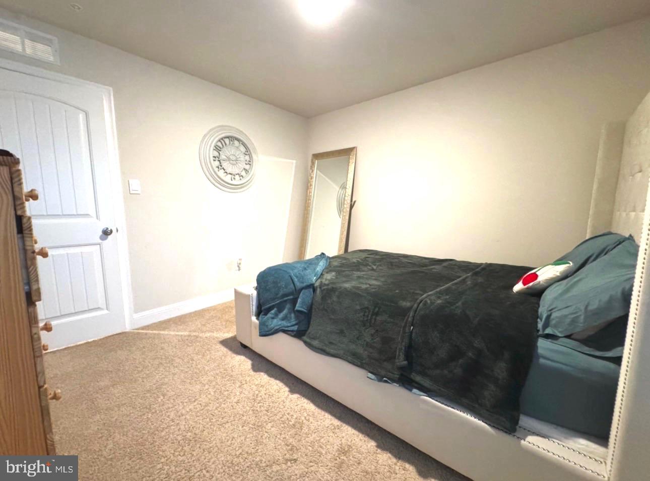 28 Buttercup Circle Elkton, MD 21921 - Photo 26 of 27 a bedroom with a bed and a cabinets