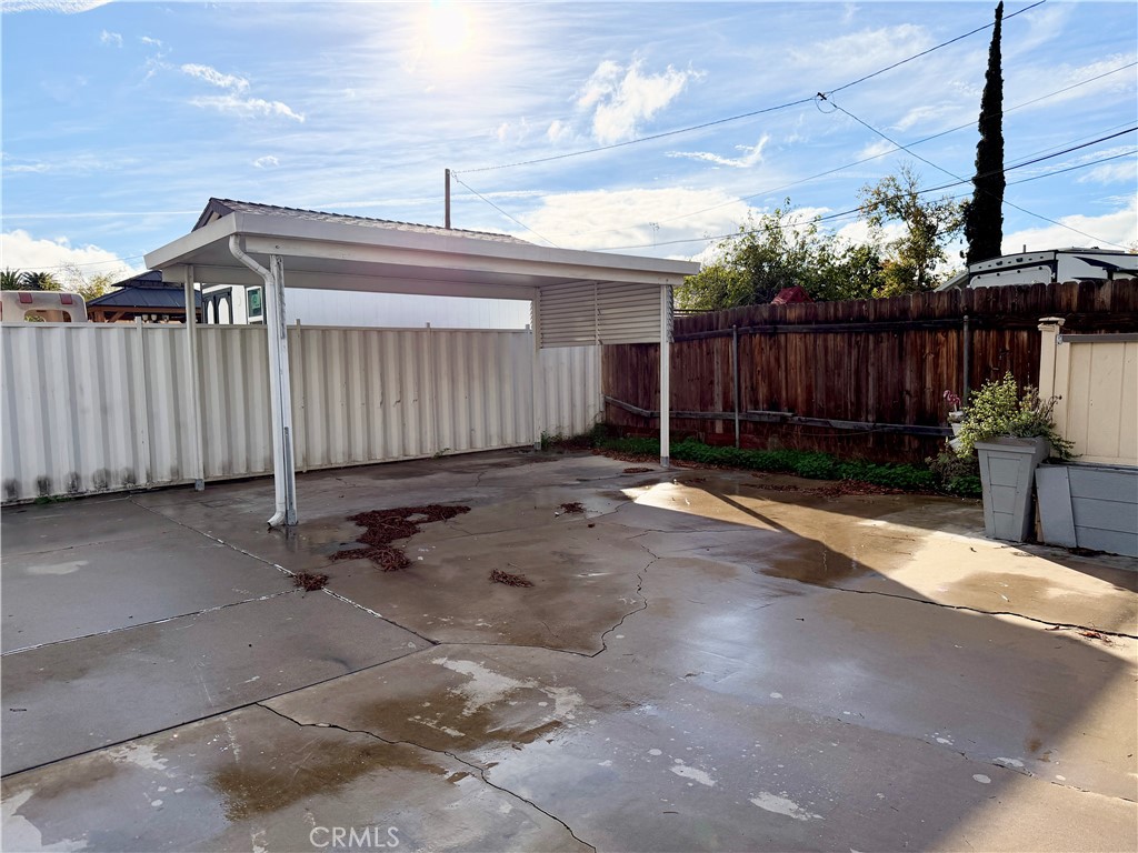 4451 Victoria Riverside, CA 92507 - Photo 13 of 17 a view of a backyard with wooden fence
