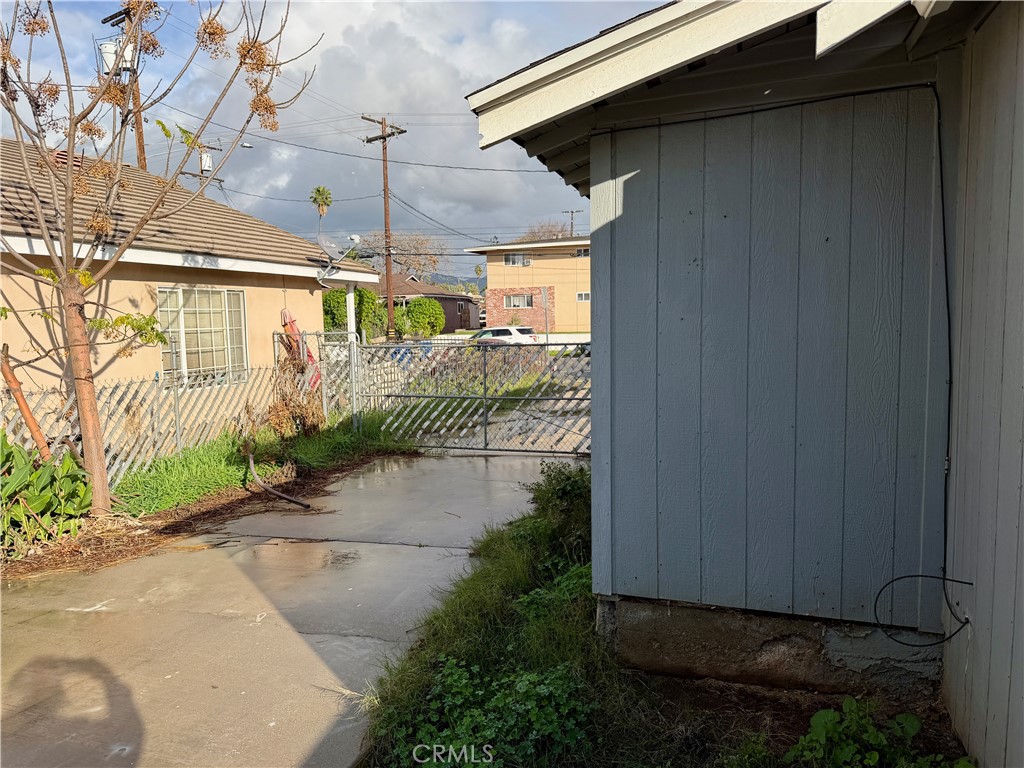 4451 Victoria Riverside, CA 92507 - Photo 14 of 17 a view of a house with a yard