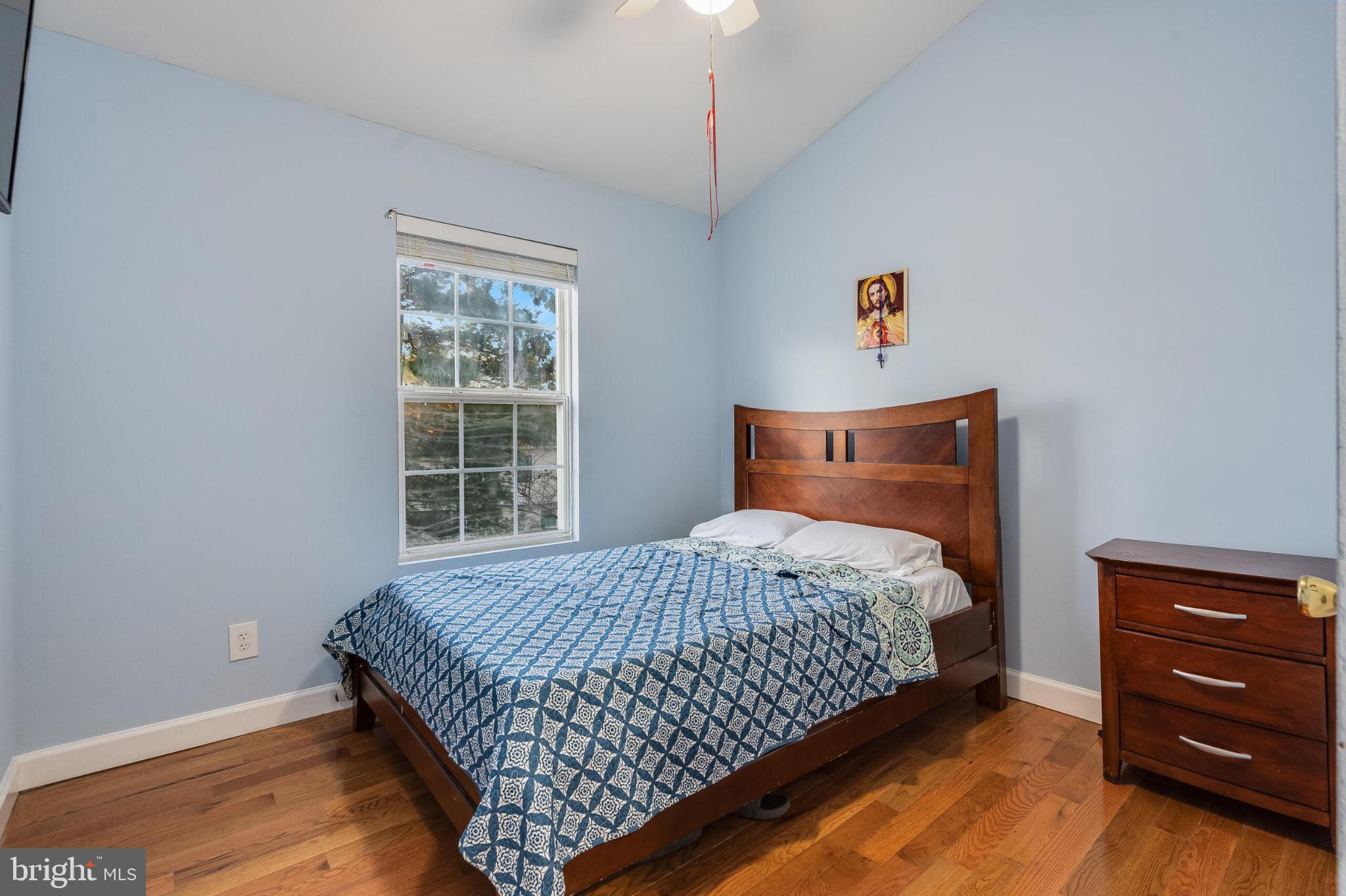 14087 Asher View Centreville, VA 20121 - Photo 11 of 26 Cozy bedroom with serene blue walls.