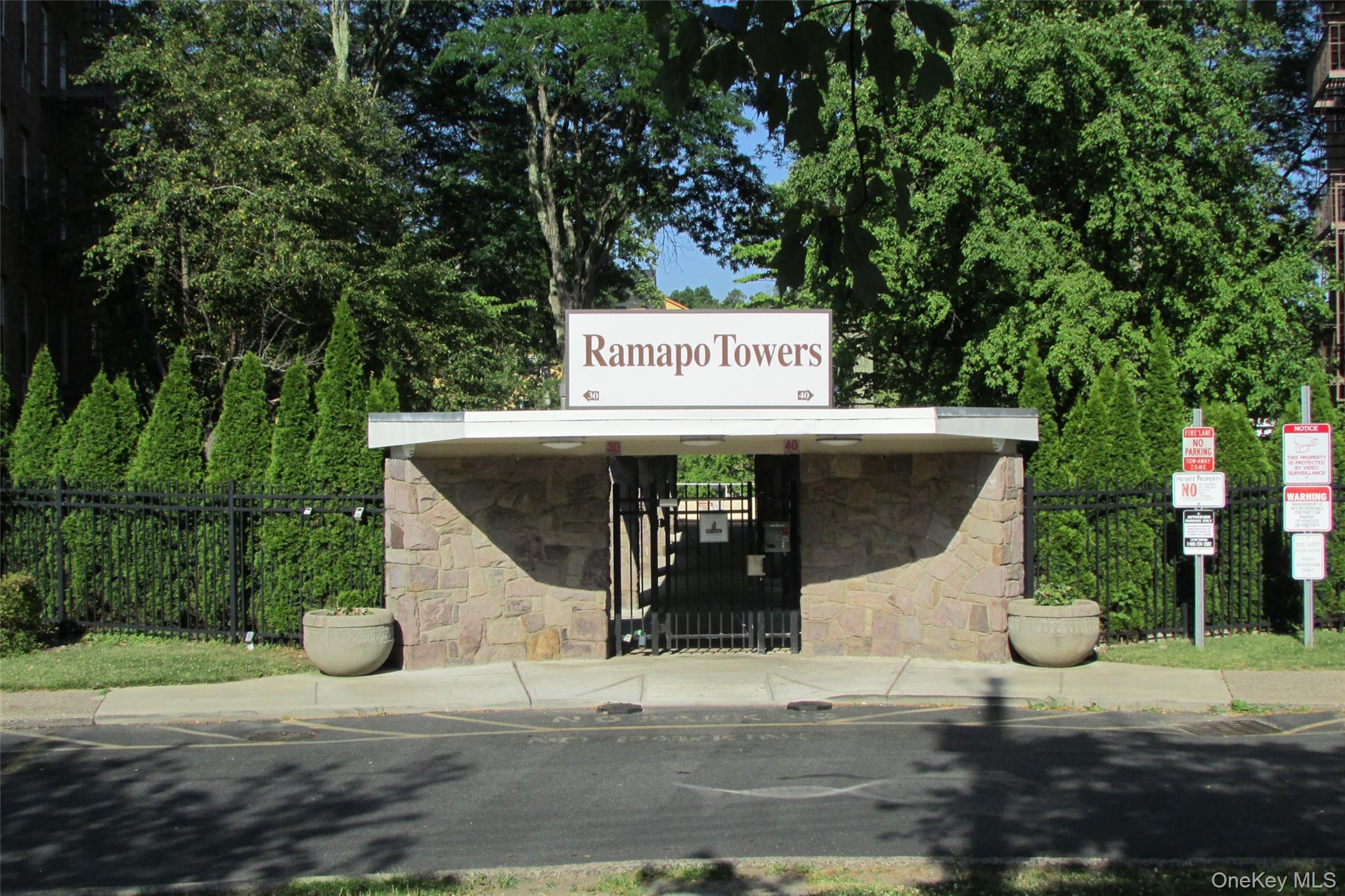 a view of a wooden house with a yard