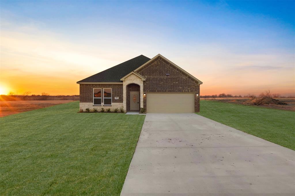 921 Genesis Road Rice, TX 75155 - Photo 1 of 1 View of front of home featuring a lawn and a garage