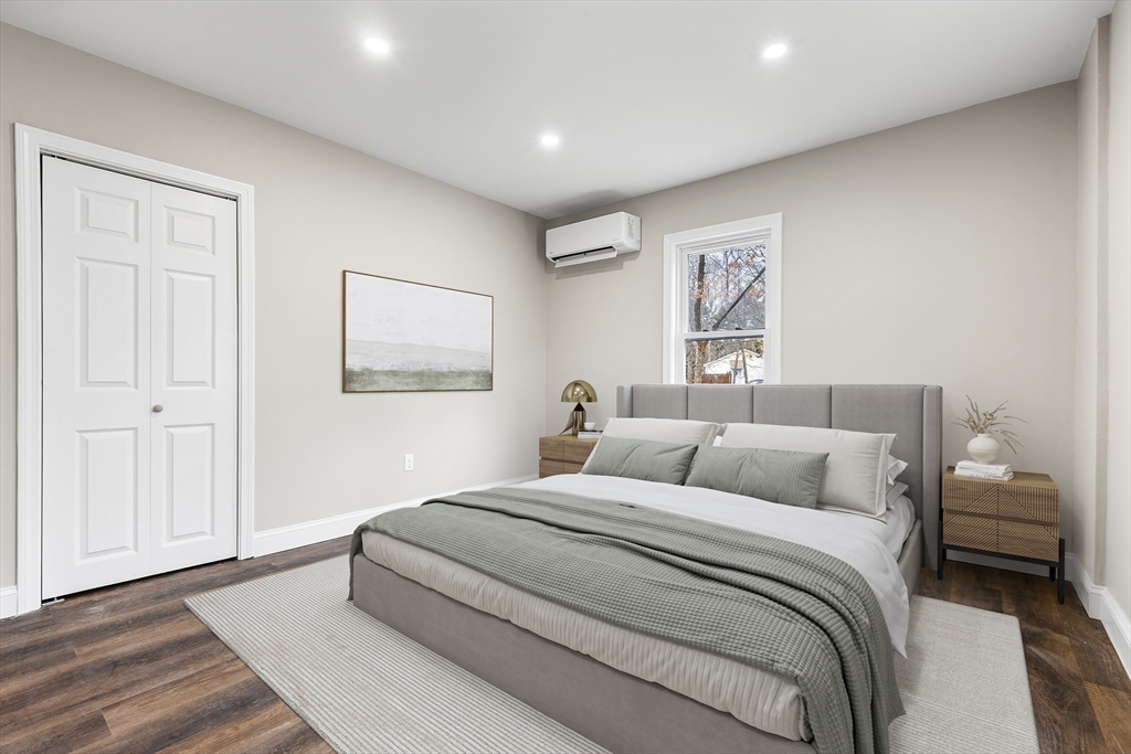 233 Central Street Foxboro, MA 02035 - Photo 6 of 16 a bedroom with a large bed and a window