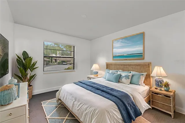a bathroom with a shower a toilet and sink