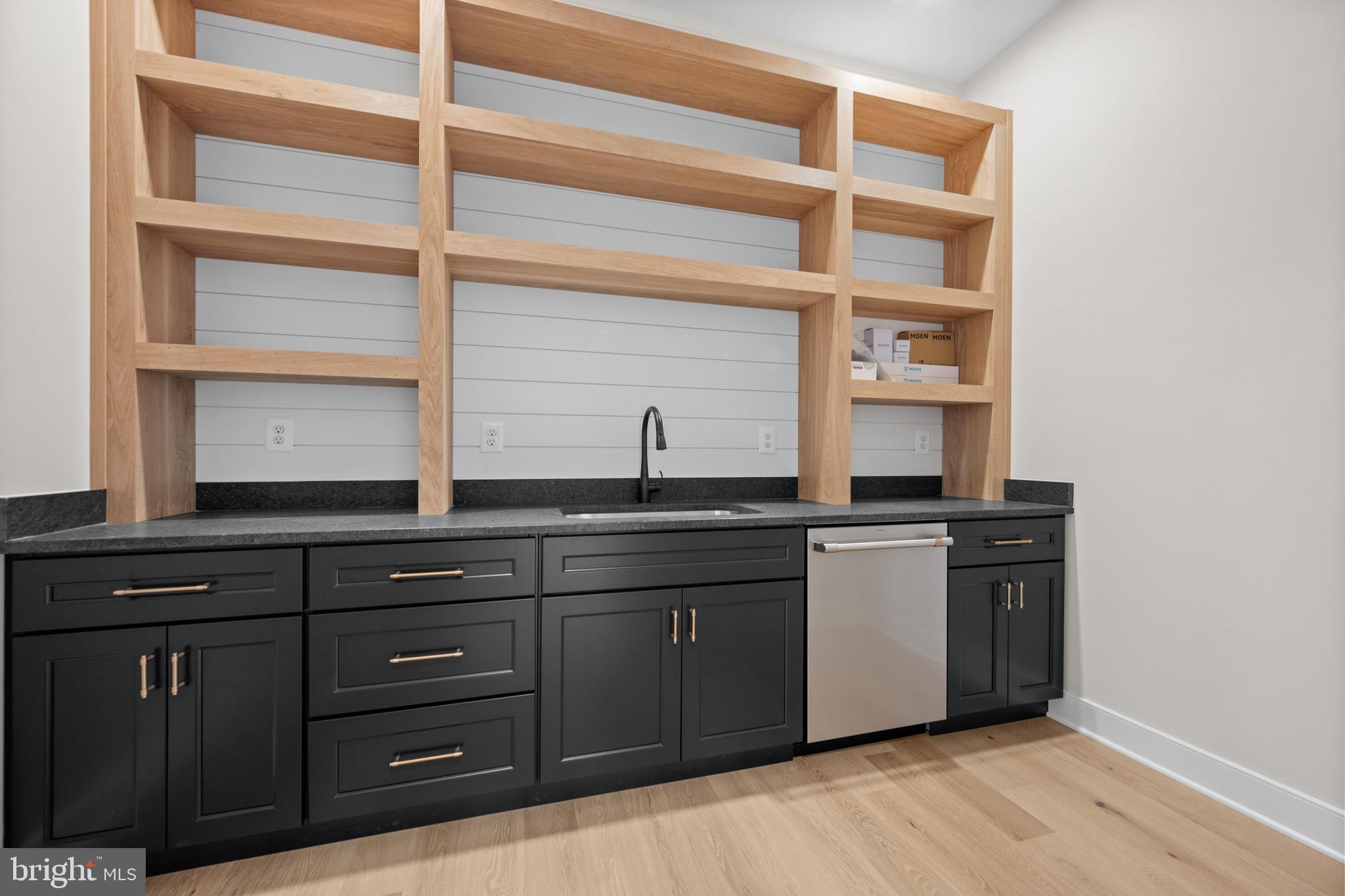 869 Morgan Station Road Woodbine, MD 21797 - Photo 23 of 38 a kitchen with a sink and cabinets