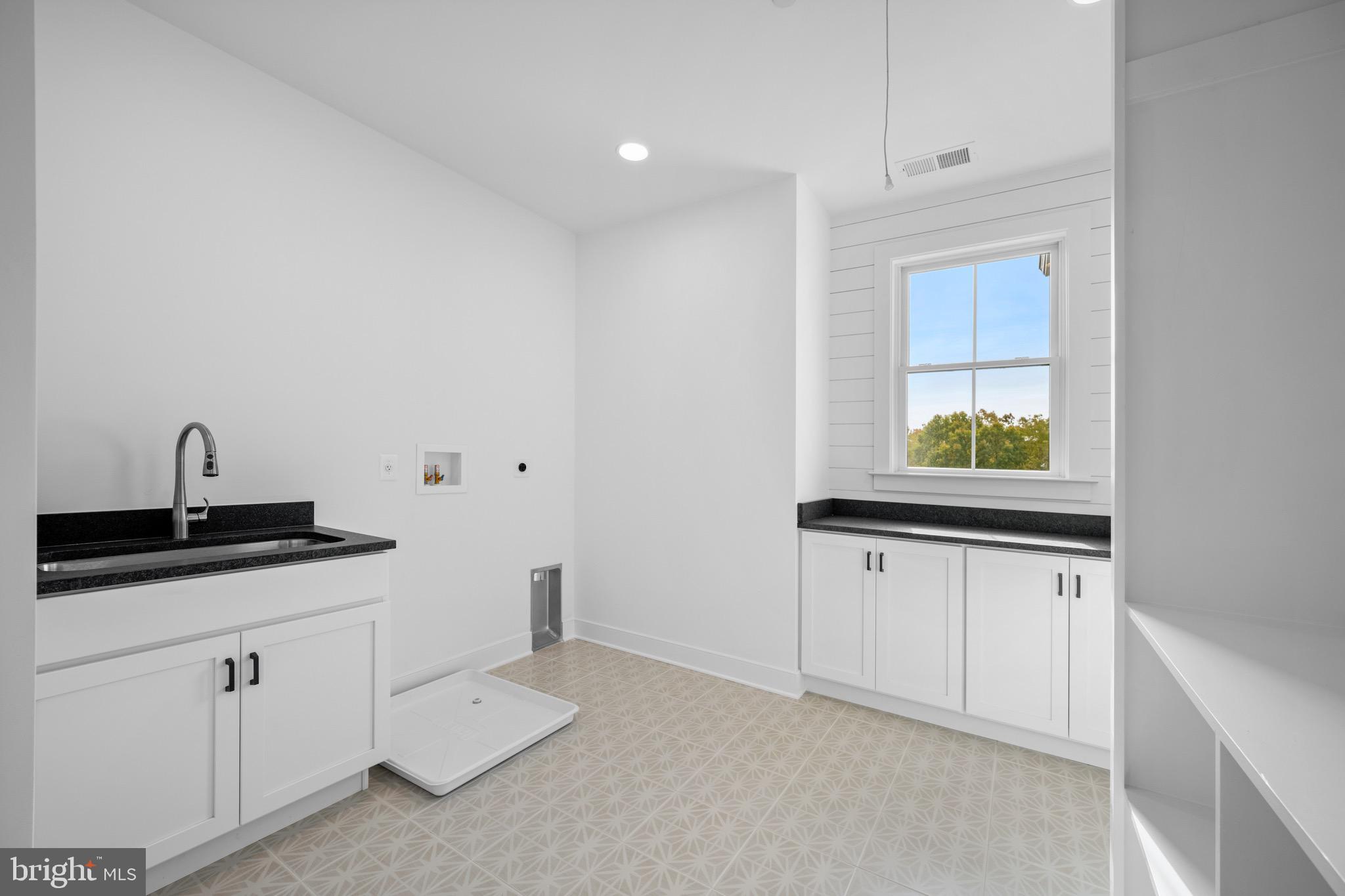 869 Morgan Station Road Woodbine, MD 21797 - Photo 33 of 38 a kitchen with white cabinets