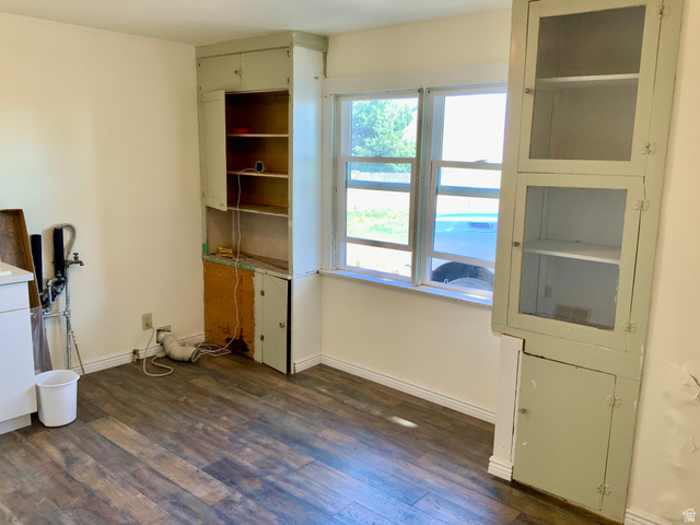 630 North Main Street Monroe, UT 84754 - Photo 8 of 63 Spare room with dark wood-style flooring and baseboards
